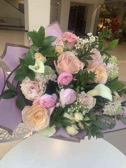 Hand tied floral bouquet Hand tied floral bouquet